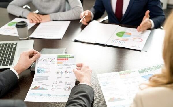 Marketing team discussing does social media help SEO performance